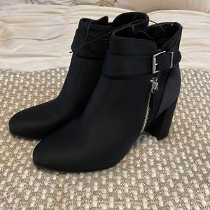 Unisa black booties. Brand new, never been worn.